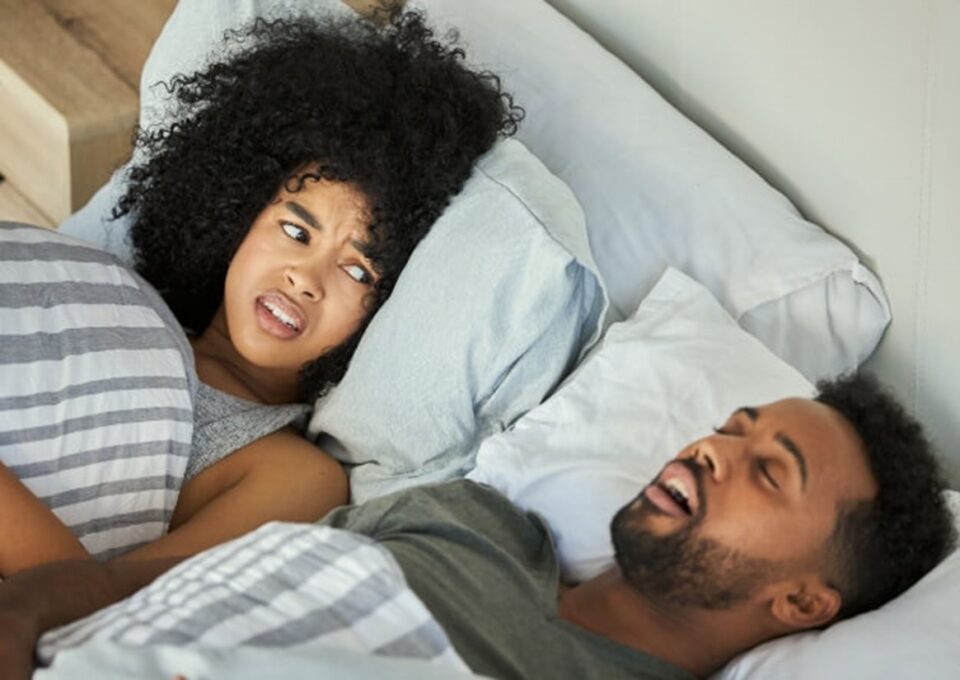 couple sleeping in bed