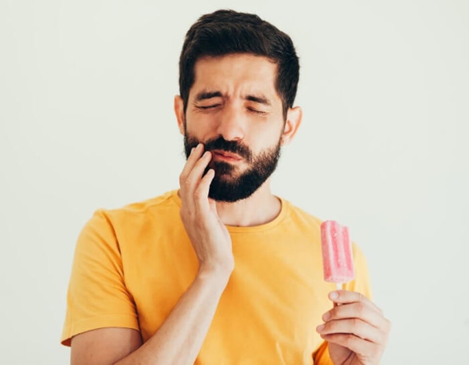 man with toothache